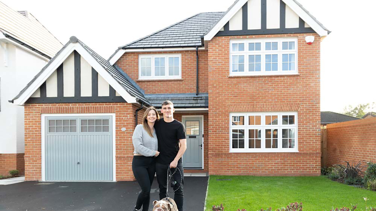 Redrow  Inspiration  Lauren Craig and Bodhi outside their new home