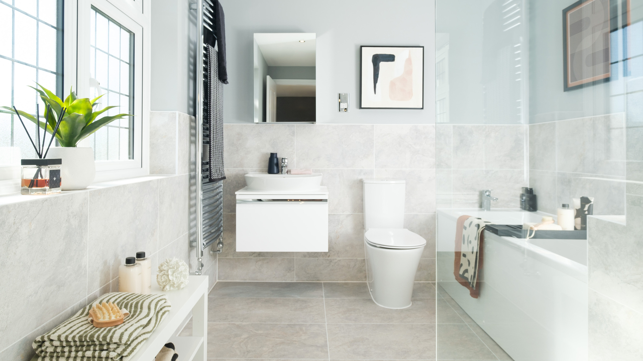 Redrow  Inspiration  A Redrow bathroom with a built in sink and bath shower