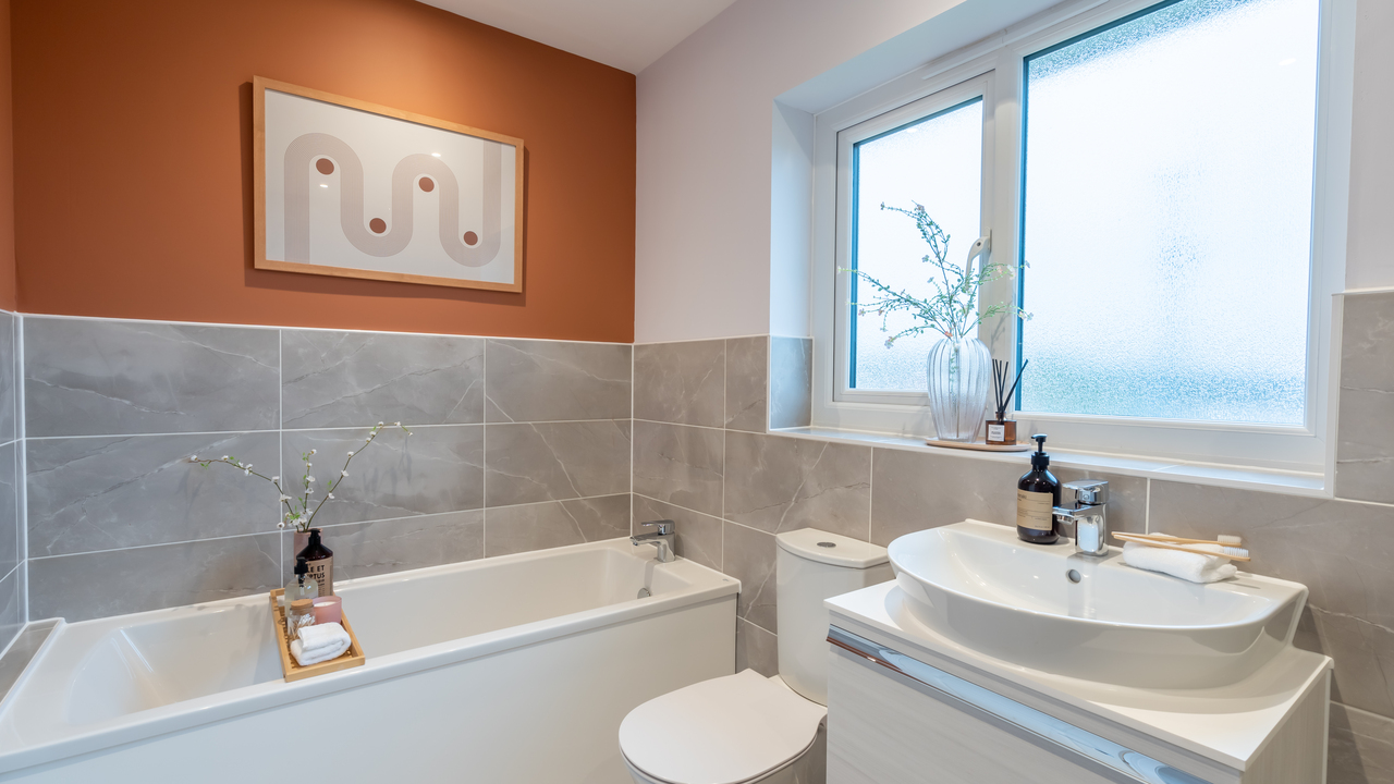 Redrow - Inspiration - White bathroom with orange feature wall