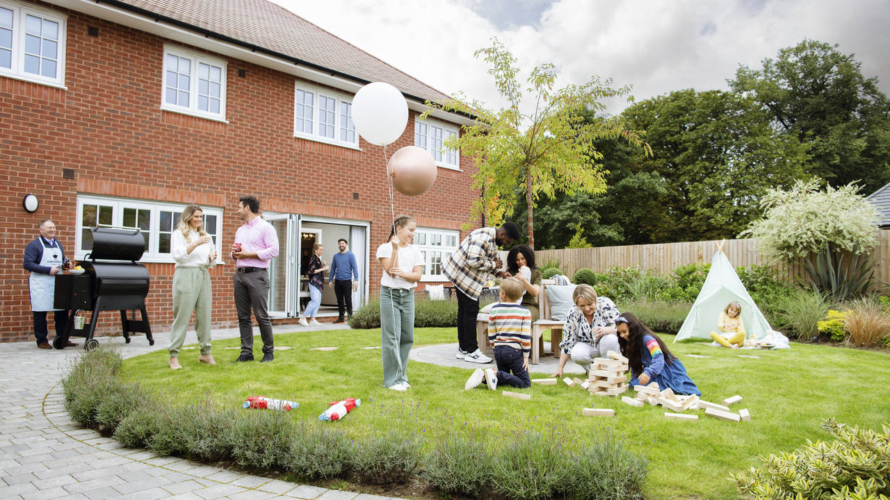 Redrow - Inspiration - Family and friends at garden party