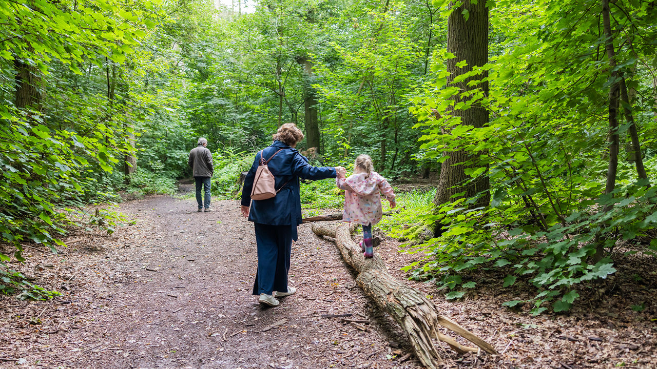 Redrow - Inpiration - Mother and daughter walking through nature park