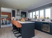 Redrow - New Homes - Navy kitchen with island (thumbnail)